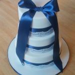 navy wedding cake with lace overlay